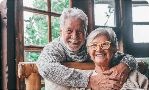 Elderly couple smiling together