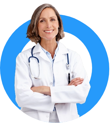 A doctor smilling with a stethoscope around her neck